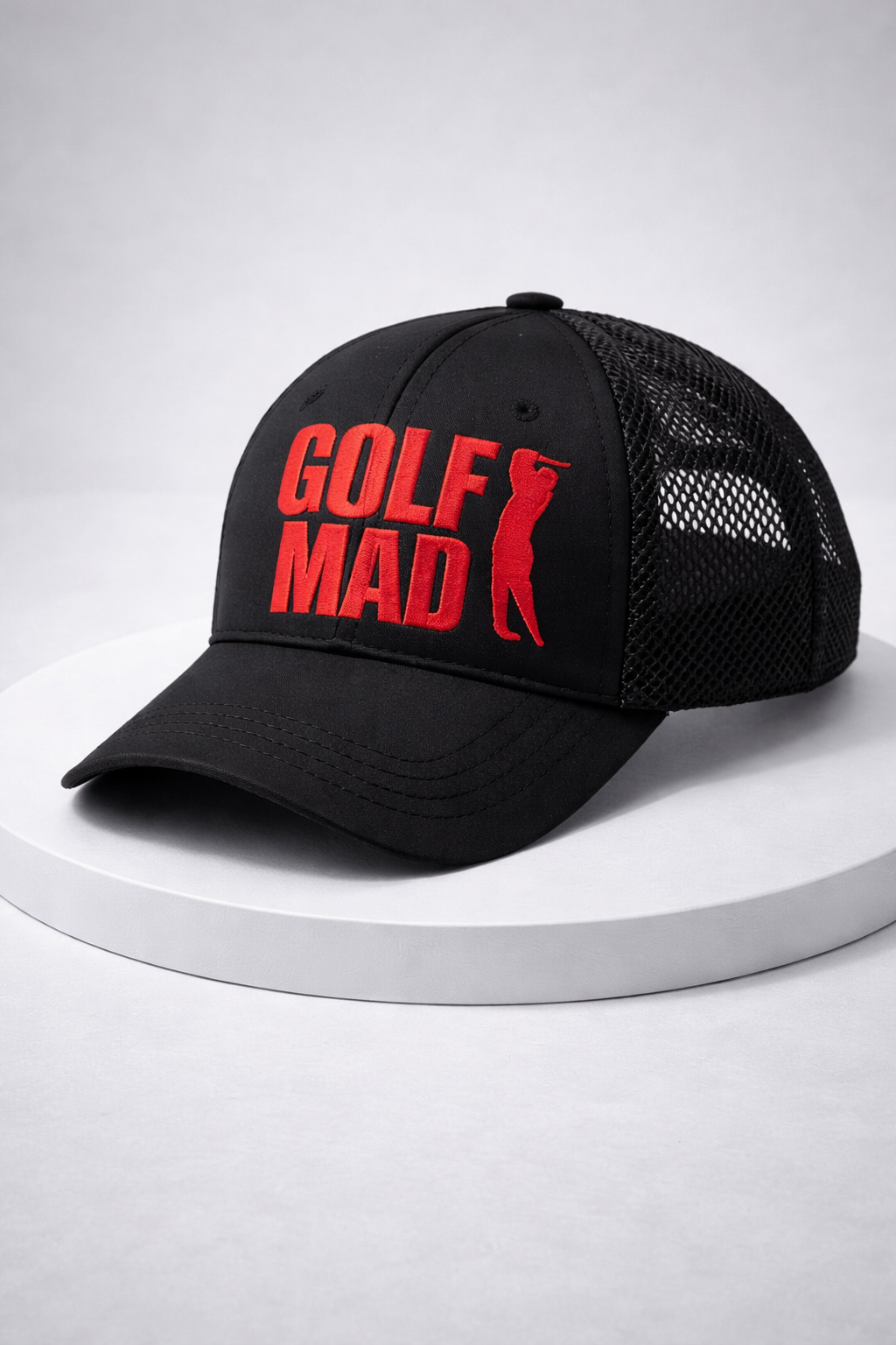 Black GOLF MAD trucker cap with red embroidery